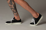 Load image into Gallery viewer, Black and white sustainable shoes 
